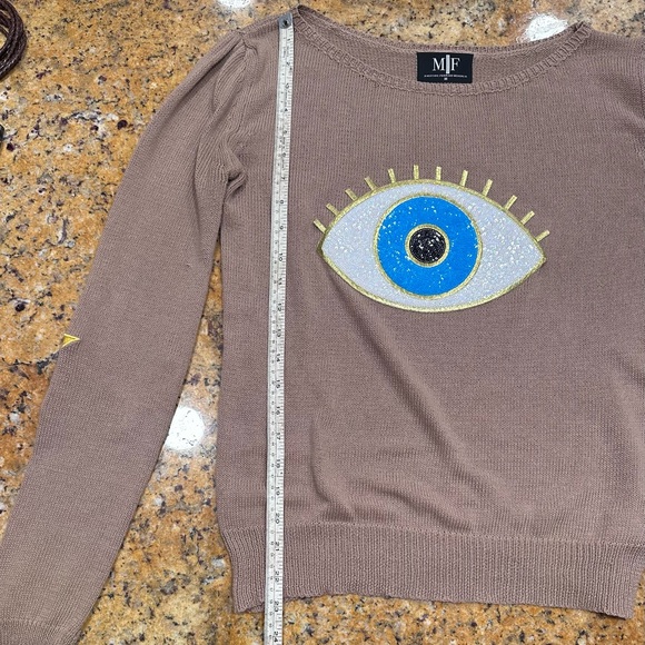 Moving Forward Tan Sweater with Blue and Gold Evil Eye Design - Picture 6 of 8